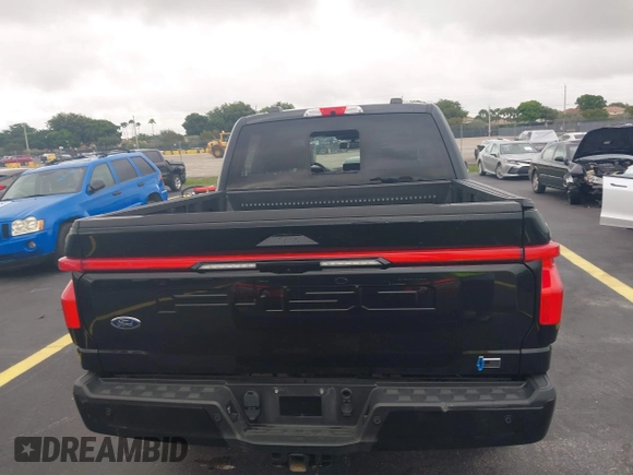 2023 Ford F-150 Lightning Pro with VIN 1FT6W1EV3PWG08587, listed as a IAAI auction lot 42418036 with Not provided miles and . Bid and sale history available at DreamBid. Image 15.