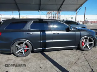 2021 Dodge Durango SRT Hellcat z VIN 1C4SDJH99MC818692, wystawiony jako IAAI lot #41070204 z przebiegiem 12 105 mil mil oraz . Historia ofert i sprzedaży dostępna na DreamBid. Obrazek 14.