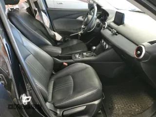 2019 Mazda CX-3 Grand Touring z VIN JM1DKDD72K1401203, wystawiony jako Copart lot #56408335 z przebiegiem 62 923 mil mil oraz Szkody całkowita. Historia ofert i sprzedaży dostępna na DreamBid. Obrazek 7.