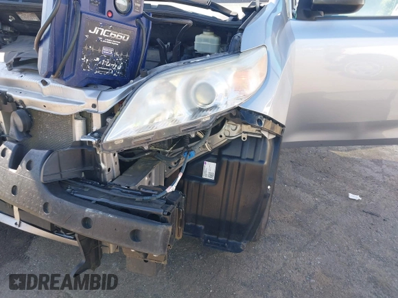 2015 Toyota Sienna L with VIN 5TDZK3DCXFS594786, listed as a IAAI auction lot 42292618 with 180,119 mi miles and . Bid and sale history available at DreamBid. Image 6.