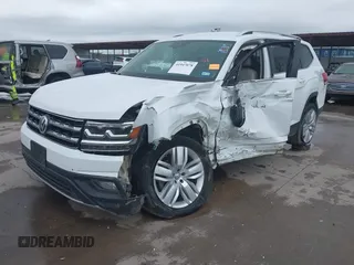 2019 Volkswagen Atlas SE z VIN 1V2WR2CA9KC593891, wystawiony jako IAAI lot #41947078 z przebiegiem 74 525 mil mil oraz . Historia ofert i sprzedaży dostępna na DreamBid. Obrazek 21.