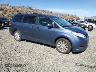 2014 Toyota Sienna LE with VIN 5TDJK3DC7ES081393, listed as a Copart auction lot 46713665 with 184,986 mi miles and Clean Title. Bid and sale history available at DreamBid. Image 4.