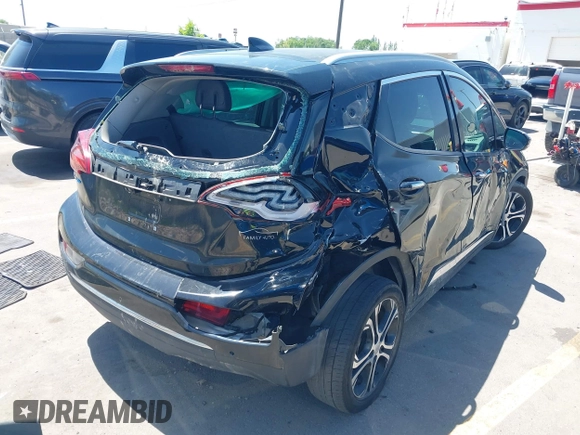 2017 Chevrolet Bolt EV Premier with VIN 1G1FX6S04H4180781, listed as a IAAI auction lot 42228857 with 152,133 mi miles and . Bid and sale history available at DreamBid. Image 4.