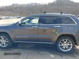 2014 Jeep Grand Cherokee Summit with VIN 1C4RJFJM5EC377129, listed as a IAAI auction lot 41763932 with 187,561 mi miles and . Bid and sale history available at DreamBid. Image 14.