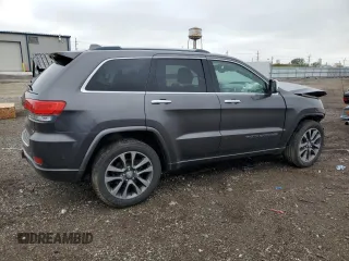 2017 Jeep Grand Cherokee Overland with VIN 1C4RJFCG8HC607872, listed as a Copart auction lot 57493195 with 164,478 mi miles and Salvage title. Bid and sale history available at DreamBid. Image 3.