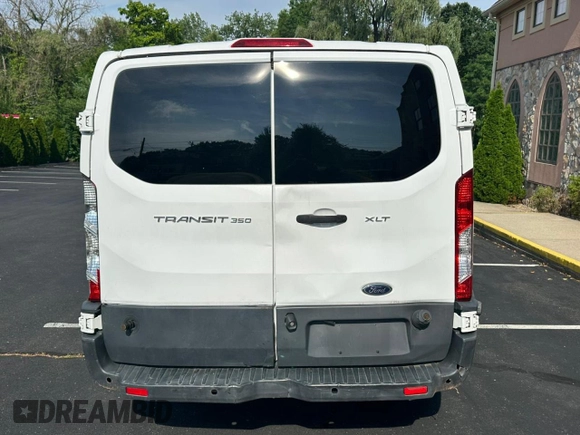 2018 Ford Transit Passenger XL z VIN 1FBZX2ZM4JKA99811, wystawiony jako Copart lot #64906155 z przebiegiem 172 355 mil mil oraz Czysty tytuł • Clean title. Historia ofert i sprzedaży dostępna na DreamBid. Obrazek 6.