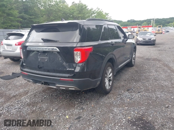 2022 Ford Explorer XLT with VIN 1FMSK8DH9NGA52903, listed as a IAAI auction lot 42704656 with 63,591 mi miles and . Bid and sale history available at DreamBid. Image 4.