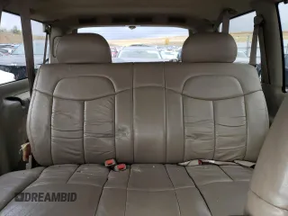 1999 GMC Safari with VIN 1GKEL19W4XB506220, listed as a Copart auction lot 77257424 with 151,966 mi miles and Clean Title. Bid and sale history available at carsss.com. Image 10.