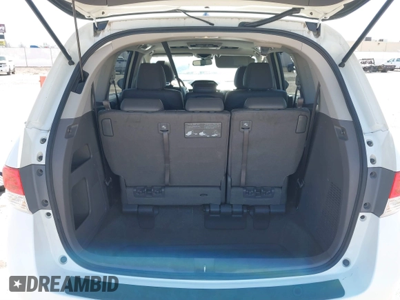 2016 Honda Odyssey EX-L z VIN 5FNRL5H65GB055317, wystawiony jako IAAI lot #41825497 z przebiegiem 117 672 mil mil oraz . Historia ofert i sprzedaży dostępna na DreamBid. Obrazek 17.