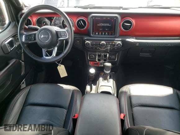 2018 Jeep Wrangler Unlimited Rubicon with VIN 1C4HJXFG1JW261472, listed as a Copart auction lot 63259345 with 60,457 mi miles and Salvage title. Bid and sale history available at DreamBid. Image 8.