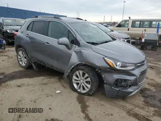2020 Chevrolet Trax Premier with VIN 3GNCJRSB5LL271003, listed as a Copart auction lot 46986775 with 45,711 mi miles and Salvage title. Bid and sale history available at DreamBid. Image 4.