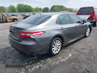2020 Toyota Camry LE with VIN 4T1C11AK1LU328682, listed as a IAAI auction lot 41966816 with 172,334 mi miles and . Bid and sale history available at DreamBid. Image 4.