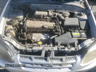 2003 Hyundai Accent GL with VIN KMHCG35C73U263320, listed as a Copart auction lot 88956145 with 191,208 mi miles and Salvage Title. Bid and sale history available at carsss.com. Image 11.
