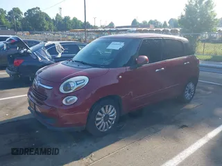 2014 FIAT 500L Easy with VIN ZFBCFABH9EZ020600, listed as a IAAI auction lot 42626910 with 84,552 mi miles and . Bid and sale history available at DreamBid. Image 2.