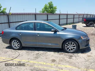 2011 Volkswagen Jetta SE with VIN 3VWDZ7AJ0BM012959, listed as a IAAI auction lot 42455475 with 128,220 mi miles and . Bid and sale history available at DreamBid. Image 13.
