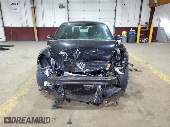 2014 Volkswagen Beetle Turbo R-Line with VIN 3VWVT7ATXEM665178, listed as a Copart auction lot 75652044 with Not Provided miles and Salvage Title. Bid and sale history available at DreamBid. Image 5.