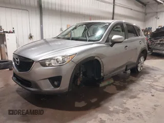 2015 Mazda CX-5 Grand Touring with VIN JM3KE4DY2F0477966, listed as a IAAI auction lot 41247178 with 116,582 mi miles. Bid and sale history available at carsss.com. Image 18.