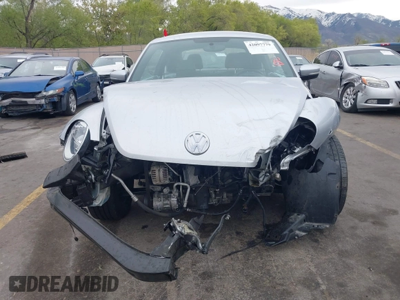 2013 Volkswagen Beetle with VIN 3VWHX7ATXDM658134, listed as a IAAI auction lot 42097779 with 47,901 mi miles and . Bid and sale history available at DreamBid. Image 13.