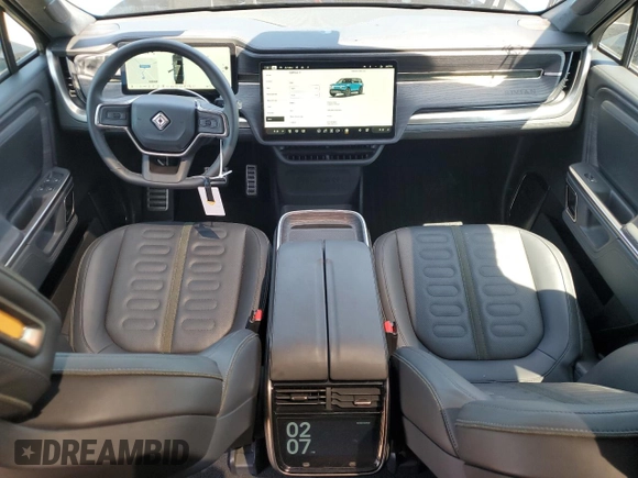 2024 Rivian R1S Adventure z VIN 7PDSGBBA0RN034793, wystawiony jako Copart lot #55091885 z przebiegiem 20 154 mil mil oraz Szkody całkowita. Historia ofert i sprzedaży dostępna na DreamBid. Obrazek 8.