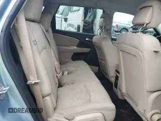 2013 Dodge Journey SXT with VIN 3C4PDCBG0DT619382, listed as a Copart auction lot 56565205 with 176,112 mi miles and Salvage title. Bid and sale history available at DreamBid. Image 11.