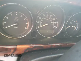 2004 Jaguar XJ with VIN SAJEA74C24SG09038, listed as a Copart auction lot 77015544 with Not Provided miles and Salvage Title. Bid and sale history available at DreamBid. Image 9.