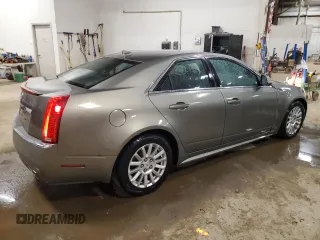 2010 Cadillac CTS Luxury z VIN 1G6DG5EG7A0147310, wystawiony jako Copart lot #49369695 z przebiegiem 213 851 mil mil oraz Czysty tytuł • Clean title. Historia ofert i sprzedaży dostępna na DreamBid. Obrazek 3.