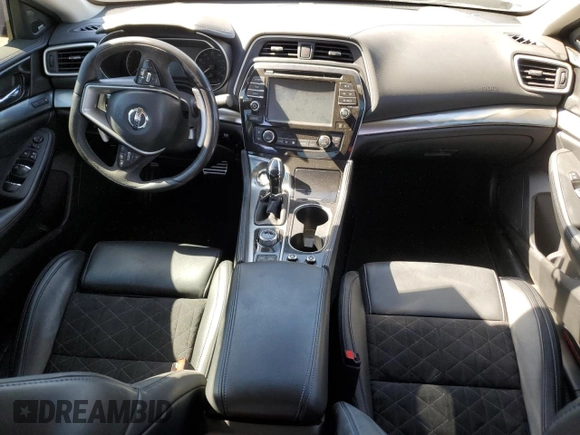2018 Nissan Maxima SR with VIN 1N4AA6AP9JC371440, listed as a Copart auction lot 75309784 with 68,459 mi miles and Salvage Title. Bid and sale history available at carsss.com. Image 8.