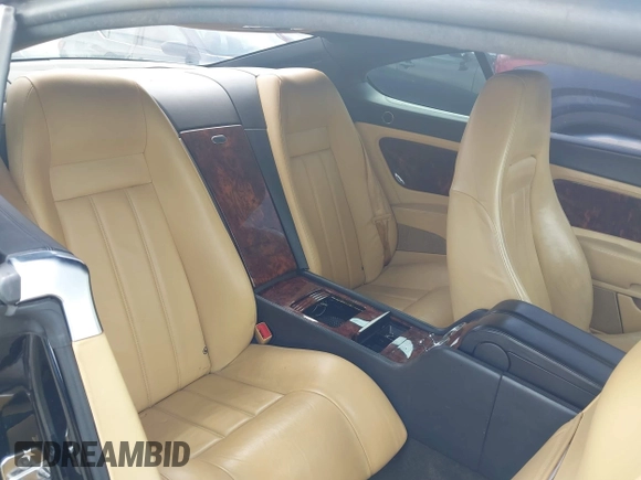 2005 Bentley Continental GT GT z VIN SCBCR63W55C025099, wystawiony jako IAAI lot #42208951 z przebiegiem 123 712 mil mil oraz . Historia ofert i sprzedaży dostępna na DreamBid. Obrazek 8.