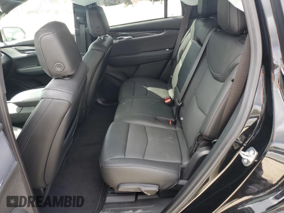 2024 Cadillac XT6 AWD Sport z VIN 1GYKPGRS6RZ749292, wystawiony jako Copart lot #50844795 z przebiegiem 12 972 mil mil oraz Szkoda całkowita • Salvage title. Historia ofert i sprzedaży dostępna na DreamBid. Obrazek 12.