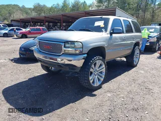 2001 GMC Yukon SLT with VIN 1GKEK13V11R220343, listed as a IAAI auction lot 41703786 with 213,518 mi miles. Bid and sale history available at carsss.com. Image 2.