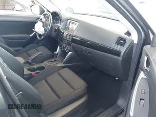2014 Mazda CX-5 Touring with VIN JM3KE2CY9E0384401, listed as a IAAI auction lot 41699913 with 75,301 mi miles. Bid and sale history available at carsss.com. Image 5.