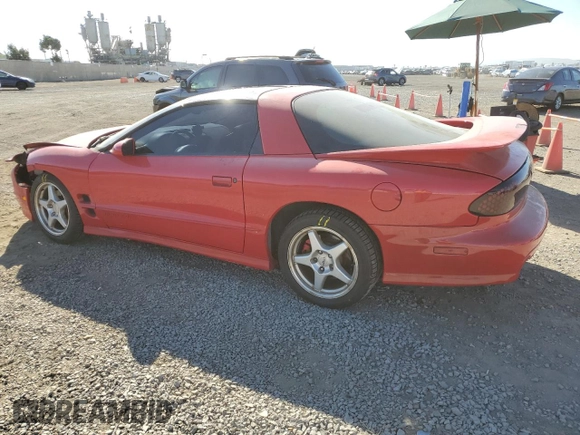 2001 Pontiac Firebird Formula z VIN 2G2FV22G112117625, wystawiony jako Copart lot #81836394 z przebiegiem 142 503 mil mil oraz Szkoda całkowita • Salvage title. Historia ofert i sprzedaży dostępna na DreamBid. Obrazek 2.
