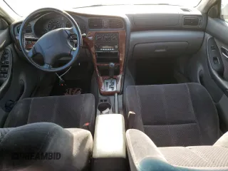2004 Subaru Legacy Sedan (Natl) L with VIN 4S3BE625747207214, listed as a Copart auction lot 57332204 with 208,106 mi miles and Salvage Title. Bid and sale history available at carsss.com. Image 8.