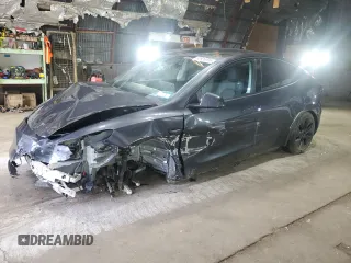 2024 Tesla Model Y Long Range with VIN 7SAYGDEE4RF154576, listed as a Copart auction lot 60926395 with Not provided miles and Salvage title. Bid and sale history available at DreamBid. Image 1.