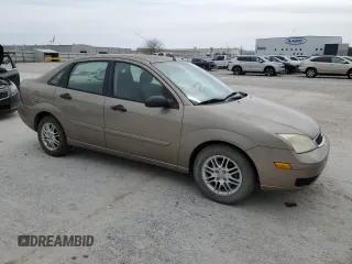 2005 Ford Focus S with VIN 1FAFP34N05W224117, listed as a Copart auction lot 48789845 with 291,009 mi miles and Salvage Title. Bid and sale history available at carsss.com. Image 4.