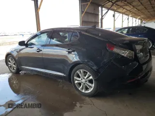 2013 Kia Optima EX z VIN 5XXGN4A75DG253693, wystawiony jako Copart lot #59227785 z przebiegiem 191 062 mil mil oraz Szkoda całkowita • Salvage title. Historia ofert i sprzedaży dostępna na DreamBid. Obrazek 2.