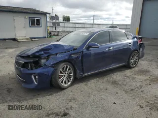 2018 Kia Optima SX with VIN 5XXGV4L25JG230508, listed as a Copart auction lot 56423135 with 100,575 mi miles and Salvage title. Bid and sale history available at DreamBid. Image 1.