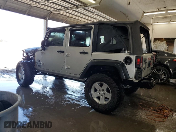 2008 Jeep Wrangler Unlimited X with VIN 1J4GB39198L517999, listed as a Copart auction lot 48200225 with Not Provided miles and Non Repairable. Bid and sale history available at DreamBid. Image 2.