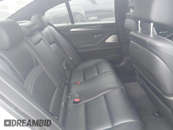 2016 BMW 5 Series 535i with VIN WBA5B1C55GG551472, listed as a IAAI auction lot 42028794 with 65,846 mi miles and . Bid and sale history available at carsss.com. Image 8.