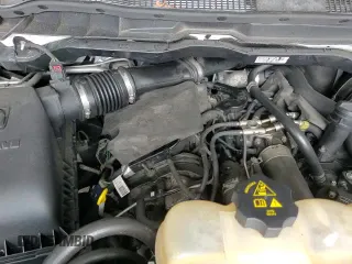 2018 Ram 1500 Tradesman z VIN 1C6RR7KMXJS231197, wystawiony jako Copart lot #62930775 z przebiegiem 114 682 mil mil oraz Czysty tytuł • Clean title. Historia ofert i sprzedaży dostępna na DreamBid. Obrazek 13.