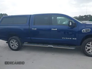 2019 Nissan Titan XD SV with VIN 1N6BA1F49KN506712, listed as a IAAI auction lot 41661789 with 107,972 mi miles. Bid and sale history available at carsss.com. Image 14.
