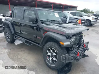 2021 Jeep Wrangler Unlimited Rubicon with VIN 1C4HJXFG7MW662092, listed as a IAAI auction lot 42139521 with 32,055 mi miles and . Bid and sale history available at carsss.com. Image 1.