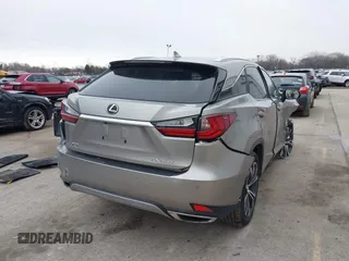 2021 Lexus RX with VIN 2T2HZMDA4MC305057, listed as a IAAI auction lot 41706486 with 37,518 mi miles. Bid and sale history available at carsss.com. Image 4.