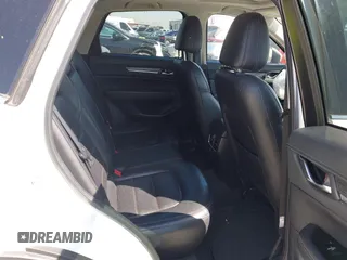 2018 Mazda CX-5 Grand Touring with VIN JM3KFADM8J0373368, listed as a IAAI auction lot 42013535 with 63,142 mi miles and . Bid and sale history available at DreamBid. Image 8.