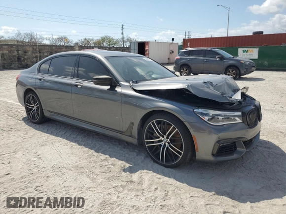 2019 BMW 7 Series 750i with VIN WBA7F0C53KGM24364, listed as a Copart auction lot 53947725 with 71,022 mi miles and Salvage Title. Bid and sale history available at carsss.com. Image 4.