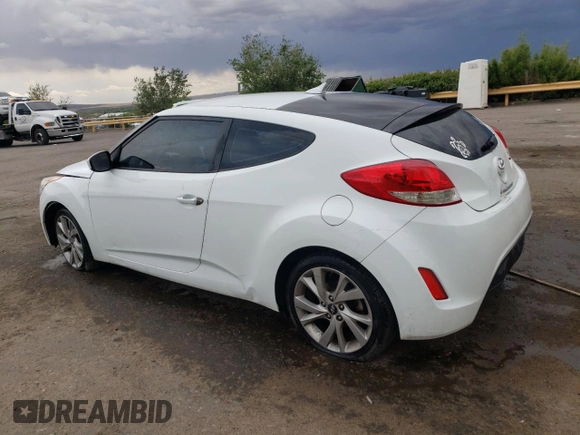 2016 Hyundai Veloster z VIN KMHTC6AD5GU266122, wystawiony jako Copart lot #55153085 z przebiegiem 100 068 mil mil oraz Czysty tytuł • Clean title. Historia ofert i sprzedaży dostępna na DreamBid. Obrazek 2.