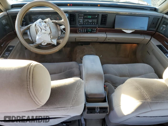 1999 Buick LeSabre Limited with VIN 1G4HR52KXXH452758, listed as a Copart auction lot 85077744 with 211,060 mi miles and Salvage Title. Bid and sale history available at DreamBid. Image 8.