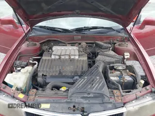 2000 Mitsubishi Diamante LS z VIN 6MMAP67P4YT003358, wystawiony jako IAAI lot #42112046 z przebiegiem 266 341 mil mil oraz . Historia ofert i sprzedaży dostępna na DreamBid. Obrazek 10.