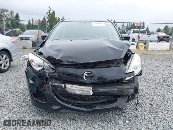 2012 Mazda 5 Grand Touring with VIN JM1CW2DL9C0112005, listed as a IAAI auction lot 42680646 with 140,724 mi miles and . Bid and sale history available at DreamBid. Image 6.