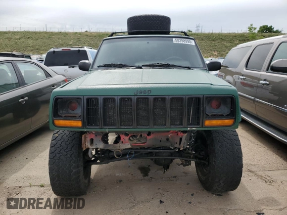 1998 Jeep Cherokee Sport with VIN 1J4FJ68SXWL210381, listed as a Copart auction lot 58398995 with 211,870 mi miles and Salvage title. Bid and sale history available at DreamBid. Image 5.
